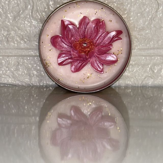 DH-14: A pink lotus on blush wax, in a metal tin, standing upright.