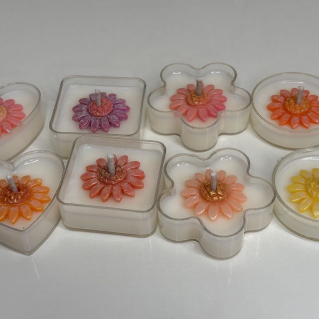 DH-17: Eight flower tea lights in heart, square, flower and round plastic cups, all eight together.