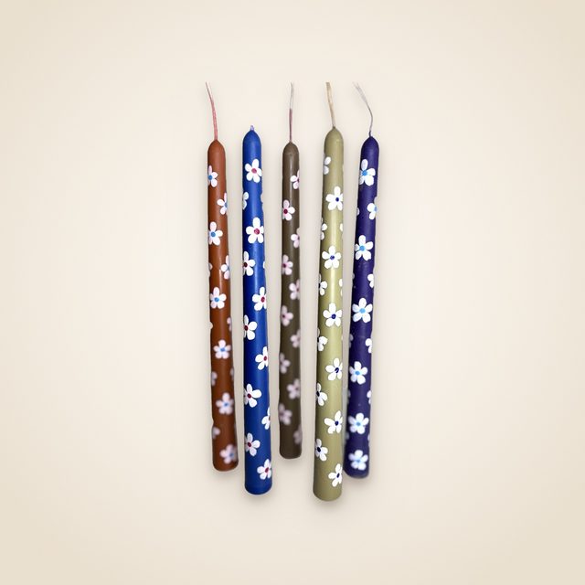 DH-18: Five hand-painted taper candles with little white flowers.